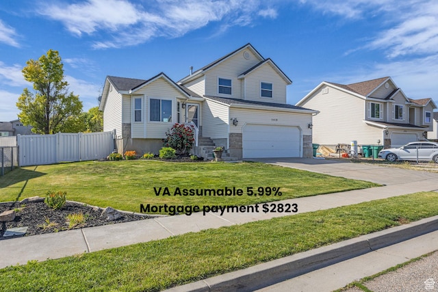 5419 S 4125 W, Roy, UT 84067 - view of front of home with concrete driveway and an attached garage
