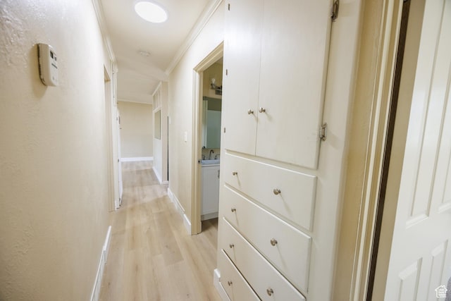 1814 W 80 S, Provo, UT 84601 - corridor with light wood-style flooring, ornamental molding, baseboards, and a sink