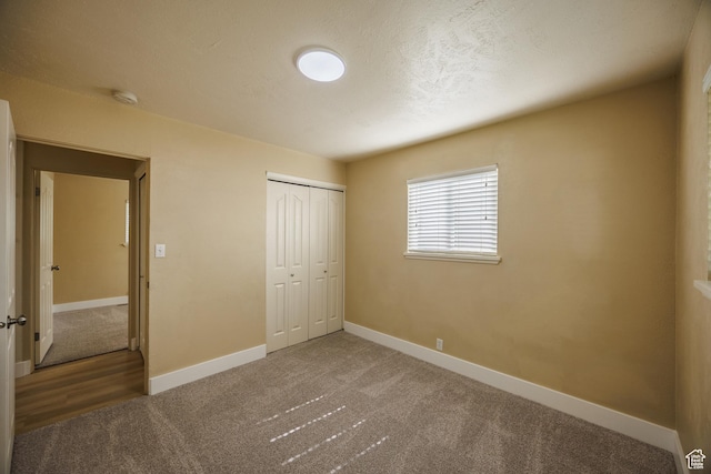 1814 W 80 S, Provo, UT 84601 - unfurnished bedroom with carpet, baseboards, and a closet