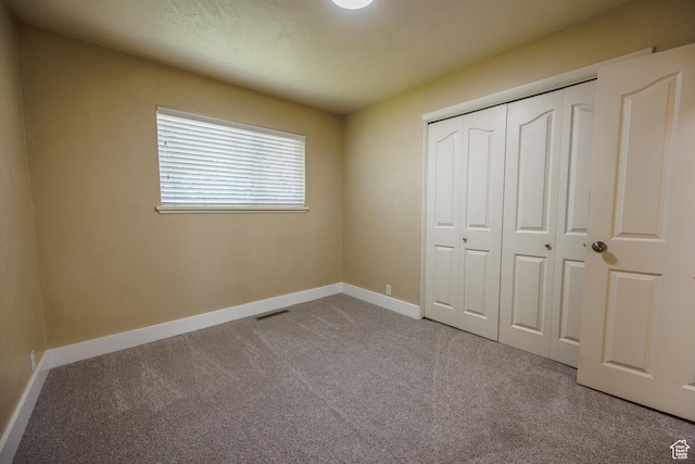 1814 W 80 S, Provo, UT 84601 - unfurnished bedroom with carpet floors, baseboards, and a closet