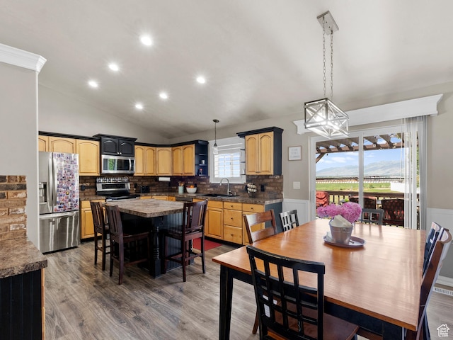 1046 W 370 N, Hyrum, UT 84319 - dining room featuring wood finished floors, recessed lighting, lofted ceiling, and a chandelier