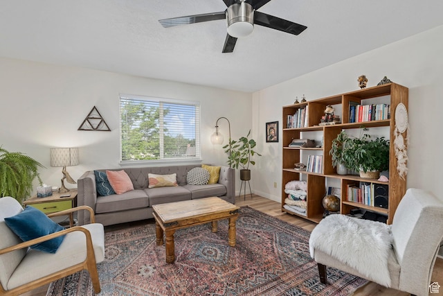116 S Canyon View Dr, Elk Ridge, UT 84651 - living area featuring ceiling fan, wood finished floors, and baseboards