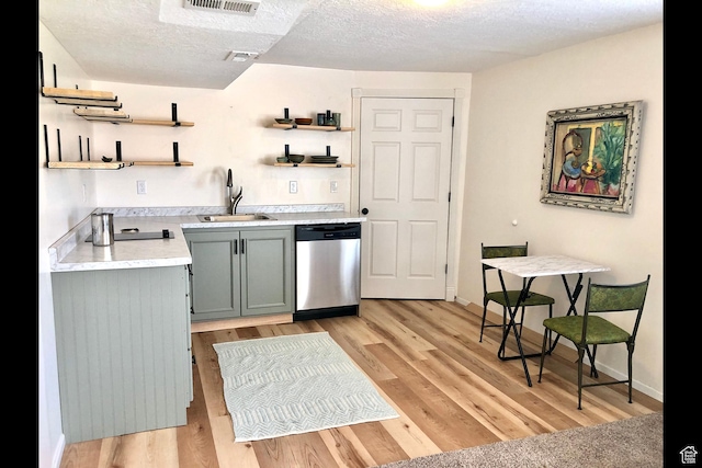 116 S Canyon View Dr, Elk Ridge, UT 84651 - kitchen with dishwasher, open shelves, a sink, light countertops, and a textured ceiling