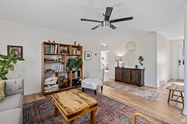 116 S Canyon View Dr, Elk Ridge, UT 84651 - living room with light wood-style flooring, ceiling fan, and baseboards