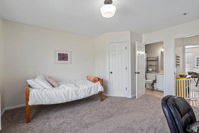 116 S Canyon View Dr, Elk Ridge, UT 84651 - bedroom with light carpet, baseboards, and ensuite bath