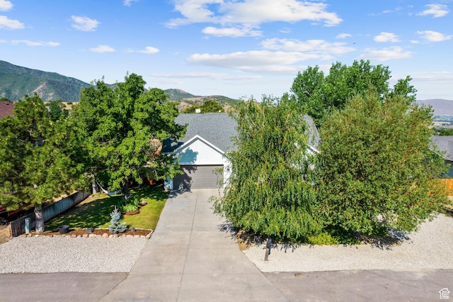 116 S Canyon View Dr, Elk Ridge, UT 84651 - obstructed view of property with a mountain view and concrete driveway