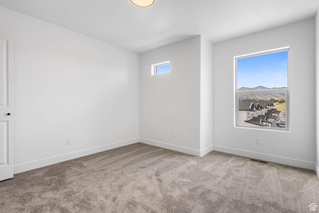 606 W Caroles Way, Tooele, UT 84074 - unfurnished room featuring carpet floors and baseboards