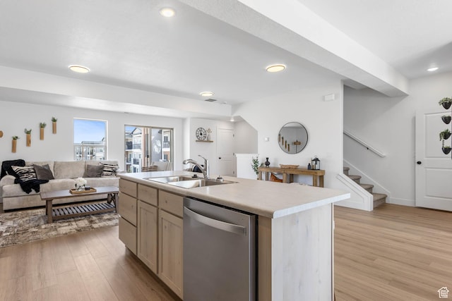 606 W Caroles Way, Tooele, UT 84074 - kitchen with dishwasher, a sink, light wood finished floors, recessed lighting, and light countertops