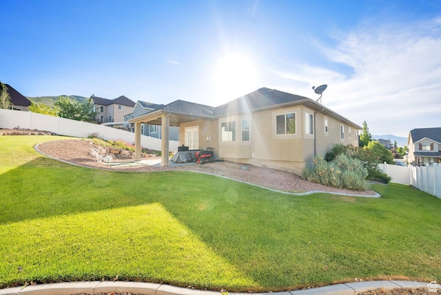14789 S Briar Park Rd W, Herriman, UT 84096 - rear view of property featuring stucco siding and a patio