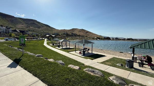 14789 S Briar Park Rd W, Herriman, UT 84096 - view of home's community with a yard and a water and mountain view