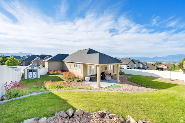 14789 S Briar Park Rd W, Herriman, UT 84096 - back of property featuring a patio area, a mountain view, a residential view, and stucco siding
