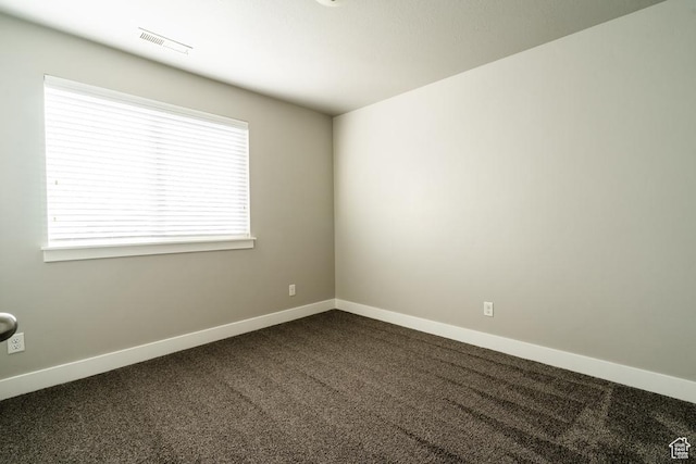 14508 S Juniper Shade Dr W, Herriman, UT 84096 - unfurnished room with dark carpet and baseboards