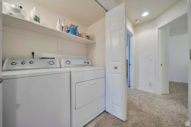 1588 N Dawson W, Tooele, UT 84074 - laundry area featuring separate washer and dryer, light carpet, and baseboards