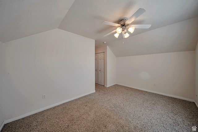 1588 N Dawson W, Tooele, UT 84074 - bonus room with vaulted ceiling, a ceiling fan, light carpet, and baseboards