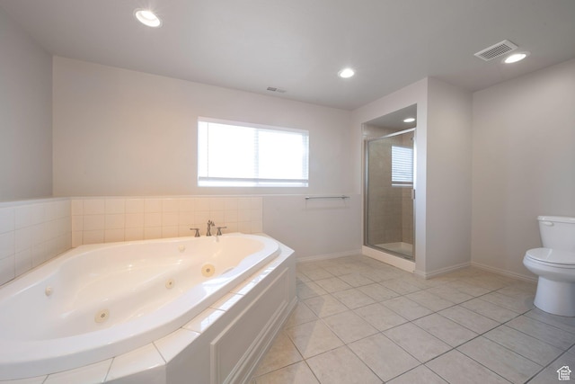 1454 N 420 E, Tooele, UT 84074 - full bath with a whirlpool tub, toilet, a shower stall, baseboards, and tile patterned flooring