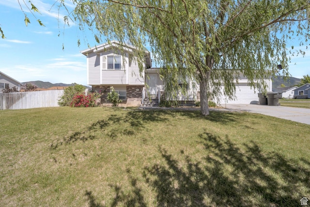 1454 N 420 E, Tooele, UT 84074 - split level home featuring driveway and a garage