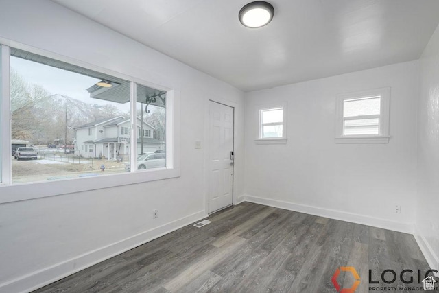 2743 Liberty Ave, Ogden, UT 84403 - empty room with baseboards and dark wood finished floors