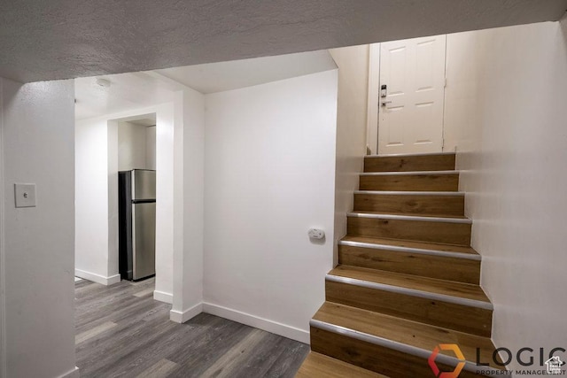2743 Liberty Ave, Ogden, UT 84403 - stairs with wood finished floors and baseboards