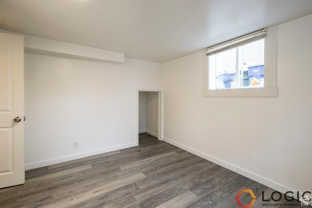 2743 Liberty Ave, Ogden, UT 84403 - unfurnished bedroom with wood finished floors and baseboards