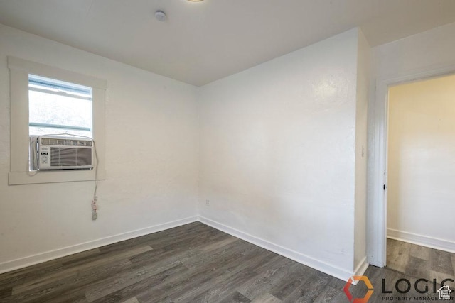 2743 Liberty Ave, Ogden, UT 84403 - spare room with dark wood-type flooring, cooling unit, and baseboards