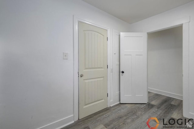 2743 Liberty Ave, Ogden, UT 84403 - unfurnished bedroom featuring dark wood-type flooring and baseboards