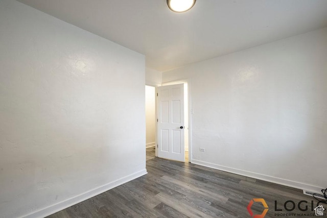 2743 Liberty Ave, Ogden, UT 84403 - spare room featuring dark wood finished floors and baseboards