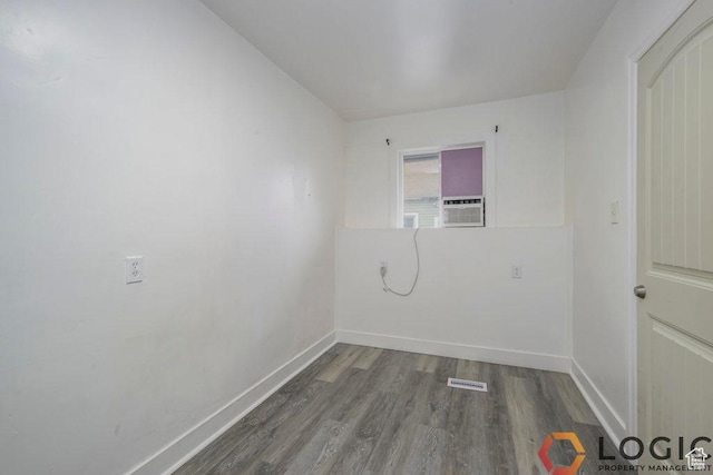 2743 Liberty Ave, Ogden, UT 84403 - unfurnished room featuring wood finished floors, baseboards, and cooling unit