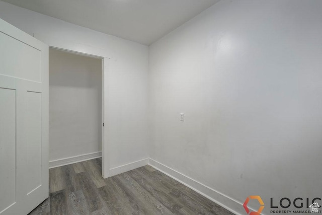 2743 Liberty Ave, Ogden, UT 84403 - unfurnished bedroom with wood finished floors and baseboards
