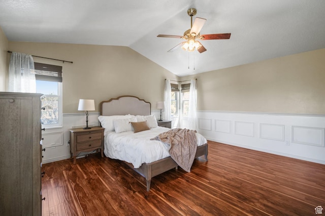 10128 S 2460 E, Sandy, UT 84092 - bedroom with vaulted ceiling, multiple windows, wood finished floors, and ceiling fan
