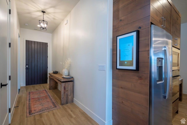 3780 Arcadia Dr Unit 53, Santa Clara, UT 84765 - foyer with light wood-style floors, baseboards, and a chandelier