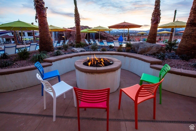 3780 Arcadia Dr Unit 53, Santa Clara, UT 84765 - view of patio with an outdoor fire pit and a swimming pool