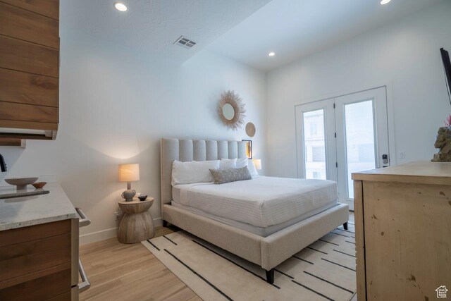 3780 Arcadia Dr Unit 53, Santa Clara, UT 84765 - bedroom with access to exterior, light wood-type flooring, recessed lighting, and baseboards