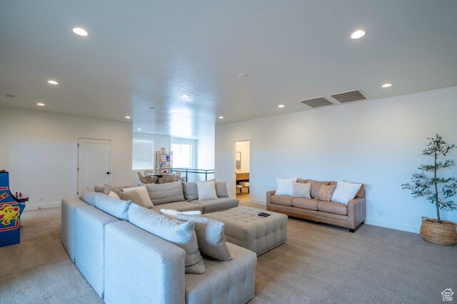 3780 Arcadia Dr Unit 53, Santa Clara, UT 84765 - living room featuring light colored carpet, recessed lighting, and baseboards