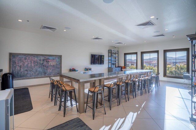 3780 Arcadia Dr Unit 53, Santa Clara, UT 84765 - kitchen with recessed lighting, light tile patterned floors, baseboards, and light countertops