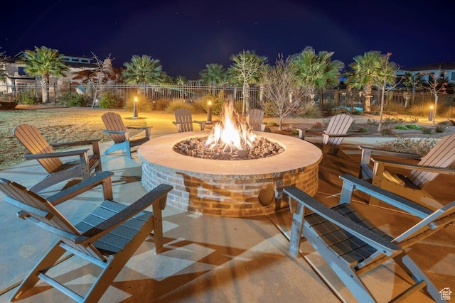 3780 Arcadia Dr Unit 53, Santa Clara, UT 84765 - patio at twilight with an outdoor fire pit and a patio