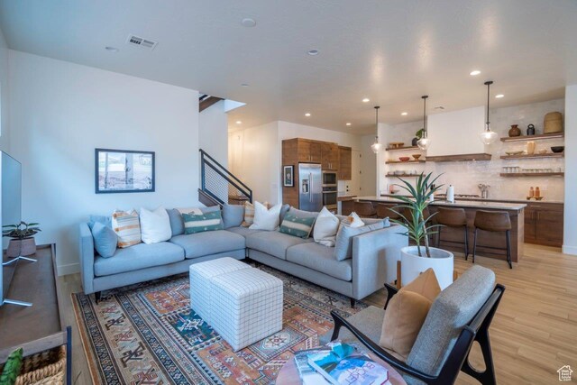 3780 Arcadia Dr Unit 53, Santa Clara, UT 84765 - living room with light wood-type flooring, stairway, and recessed lighting
