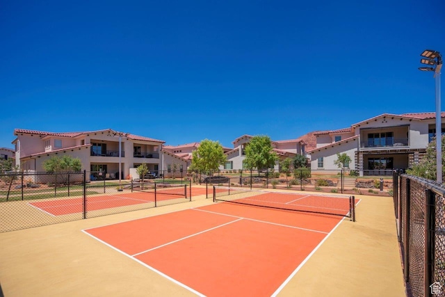 3780 Arcadia Dr Unit 53, Santa Clara, UT 84765 - view of tennis court with community basketball court and a residential view