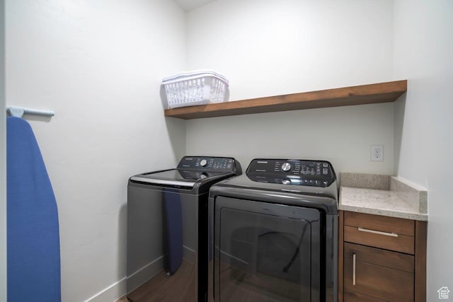 3780 Arcadia Dr Unit 53, Santa Clara, UT 84765 - laundry area with independent washer and dryer, baseboards, and wood finished floors