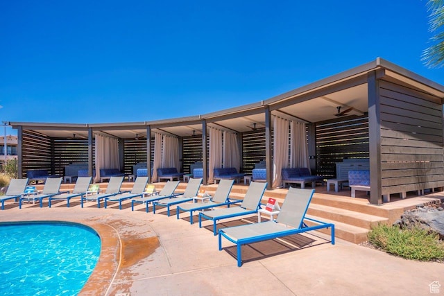 3780 Arcadia Dr Unit 53, Santa Clara, UT 84765 - outdoor pool featuring a ceiling fan and a patio