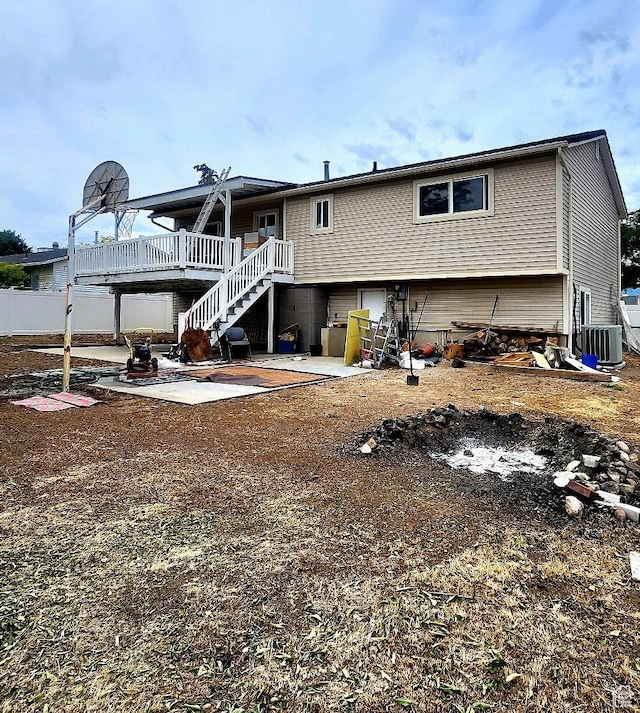 5649 S Bree St W, Taylorsville, UT 84129 - rear view of property with central AC, stairs, and a deck