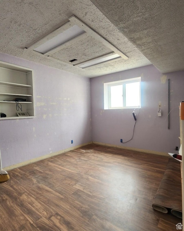 5649 S Bree St W, Taylorsville, UT 84129 - basement with wood finished floors and baseboards