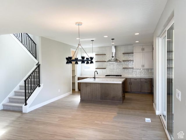 1594 W Canyon Rim N Unit 609, Lehi, UT 84043 - kitchen featuring open shelves, extractor fan, light wood-style flooring, light countertops, and recessed lighting