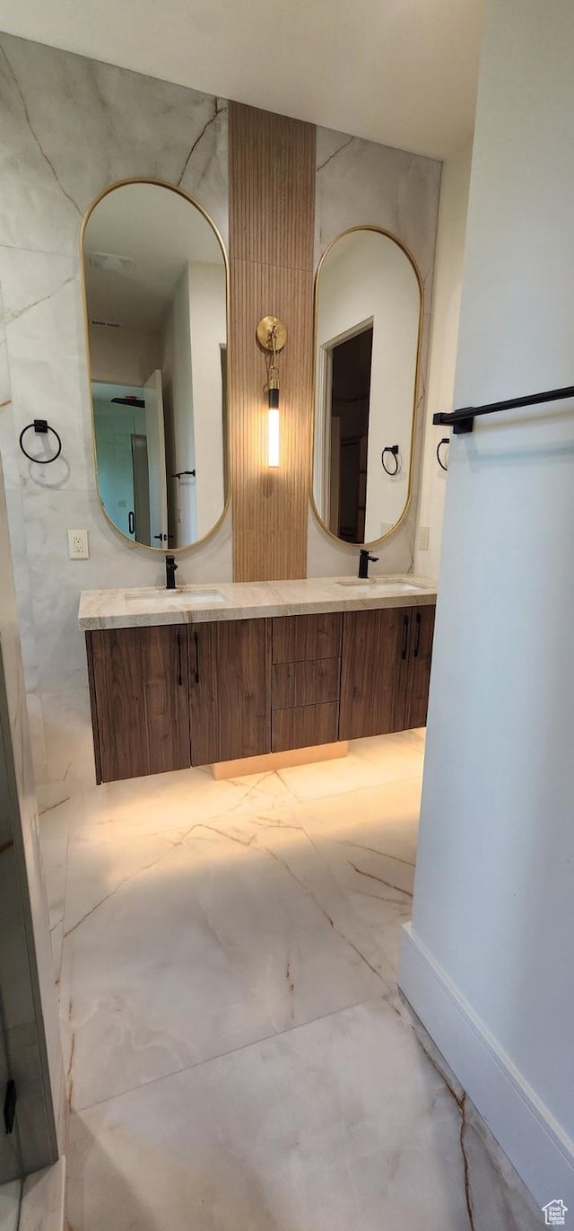 101 Crestview Cir, Park City, UT 84098 - bathroom featuring marble look tiles and double vanity