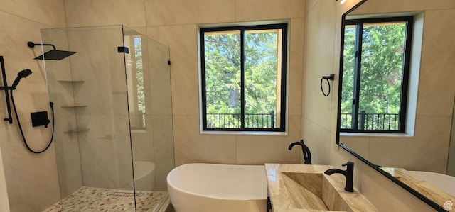 101 Crestview Cir, Park City, UT 84098 - bathroom with tiled shower, vanity, and healthy amount of natural light