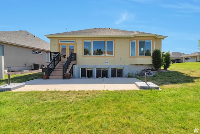2832 N Turnberry Ln, Lehi, UT 84043 - rear view of property featuring stucco siding, cooling unit, a yard, a patio, and a shingled roof