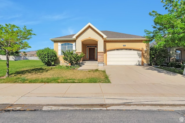 2832 N Turnberry Ln, Lehi, UT 84043 - view of front of property with stucco siding, an attached garage, and driveway