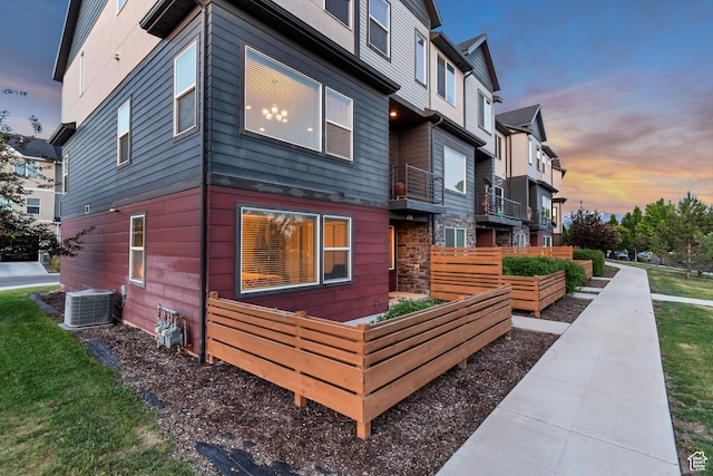 1791 W 60 S, Pleasant Grove, UT 84062 - view of home's exterior with a vegetable garden, central AC unit, and a residential view