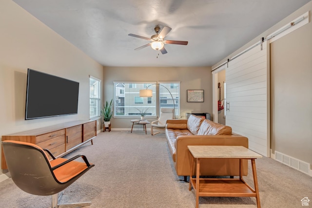 1791 W 60 S, Pleasant Grove, UT 84062 - living area with a barn door, light carpet, a ceiling fan, and baseboards