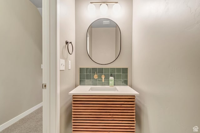 1791 W 60 S, Pleasant Grove, UT 84062 - bathroom featuring vanity, decorative backsplash, and baseboards