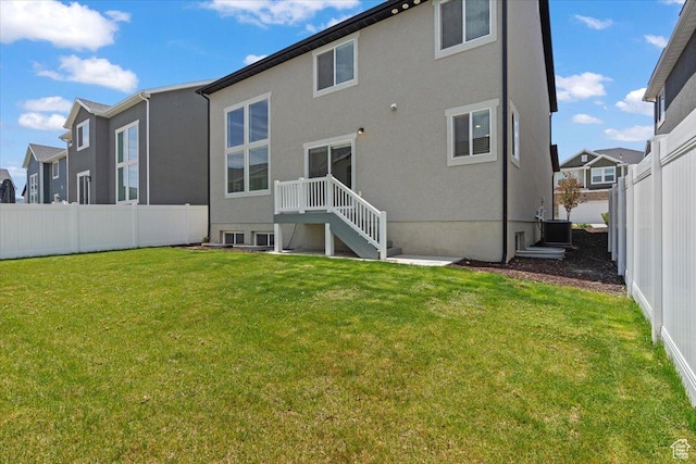 12361 S Xander Ln, Herriman, UT 84096 - rear view of house with central AC and stucco siding